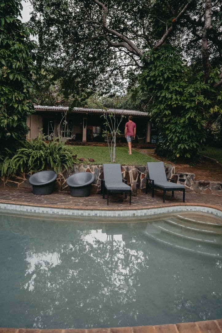 Private swimming pool with loungers